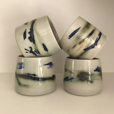 3_Berni Cooper_stoneware tea bowls with a celadon glaze and oxide detailing