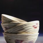 Berni Cooper - Breakfast bowls with incised lines and plum glaze detailing