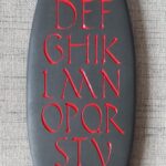 Rustic Roman alphabet -slate with red enamel paint 450x150mm