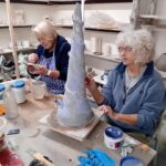 Charmain Pearson & Lesley Newman glazing at the studio