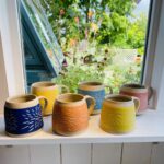 Set of sgraffito stoneware mugs