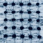 Shibori techniques on vintage fabric. Dyed with indigo dye.