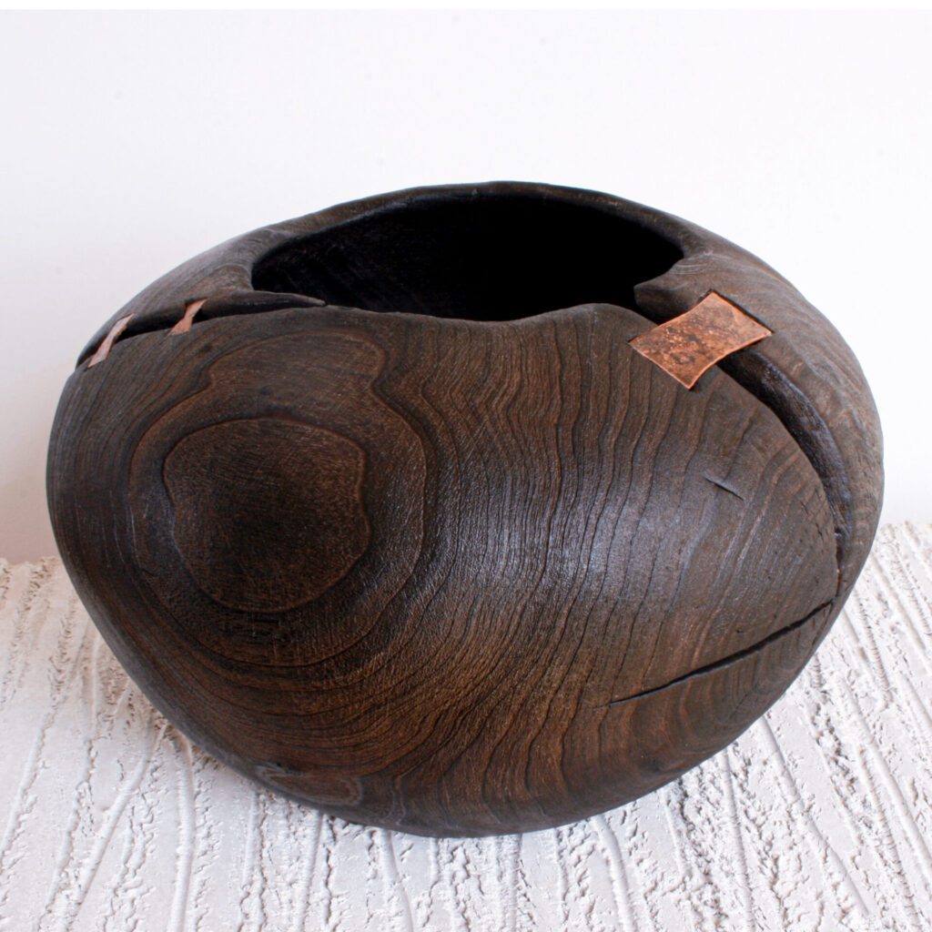 Carved Wood copper Vessel