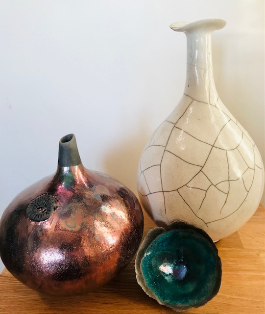 3 Raku-fired, glazed handbuilt pots inspired by organic shapes in nature..